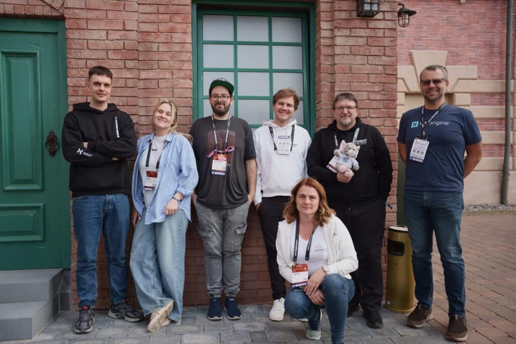 The eight-person AI-Powered Plugin Builder team outside the venue at CloudFest Hackathon 2026